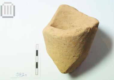Part of amphora with pointed foot/base