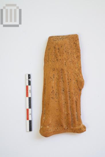 Part of figurine-plaque