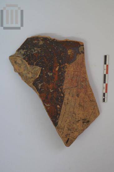 sherd of red painted vase