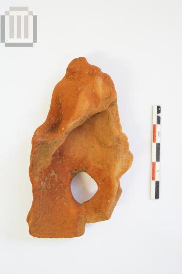 Part of seated figurine