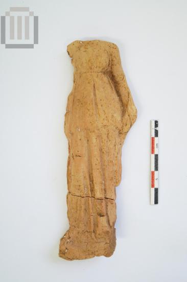 Part of female figurine