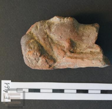 Fragment of a female figurine