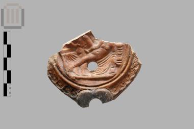 Lamp with erotic scene in relief