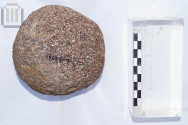 Part of a spherical stone bullet
