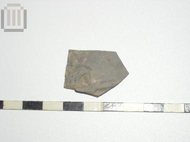 Part of a skyphos with relief moldmade decoration