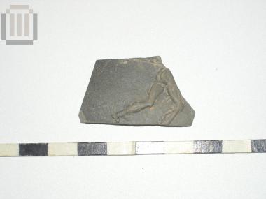 Part of a skyphos with relief moldmade decoration