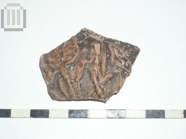 Sherd of skyphos with relief moldmade decoration