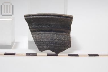 Sherd of skyphos with relief moldmade decoration