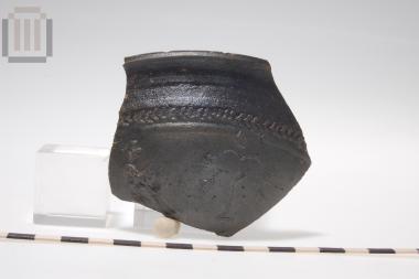 Sherd of skyphos with relief moldmade decoration