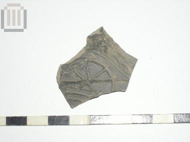Sherd of skyphos with relief moldmade decoration