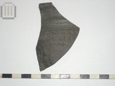 Sherd of skyphos with relief moldmade decoration