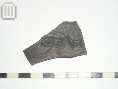 Sherd of skyphos with relief moldmade decoration