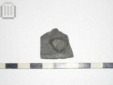 Sherd of skyphos with relief moldmade decoration