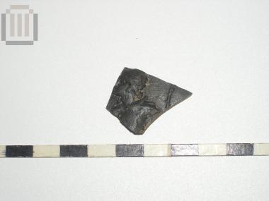 Sherd of skyphos with relief moldmade decoration