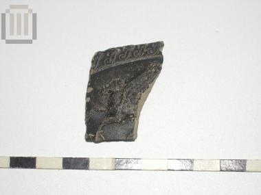 Sherd of skyphos with relief moldmade decoration