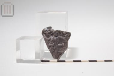 Sherd of skyphos with relief moldmade decoration