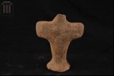 Clay cross-shaped figurine