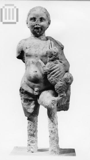 Statue of a little boy with a dog.