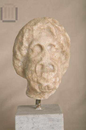 Head of Asklepius statuette.