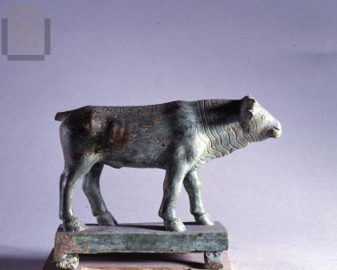 Inscribed figurine of a bull.
