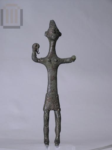 Figurine of  a  war, Syrian, deity.