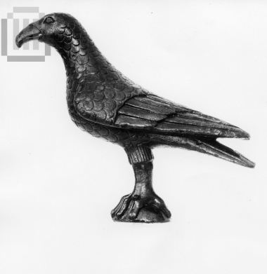 Bird figurine.