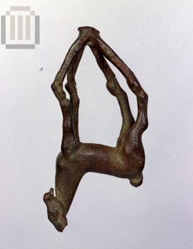 Figurine of a goat with the metal injection pipes.