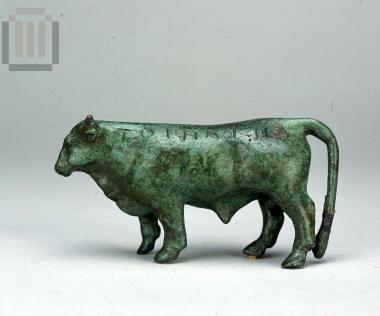 Inscribed figurine of a bull.