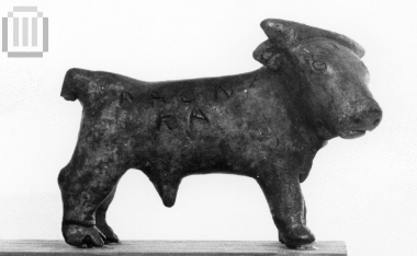 Inscribed figurine of a bull.