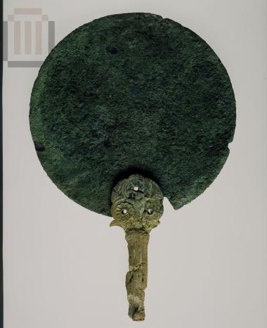 Bronze mirror with ivory handle