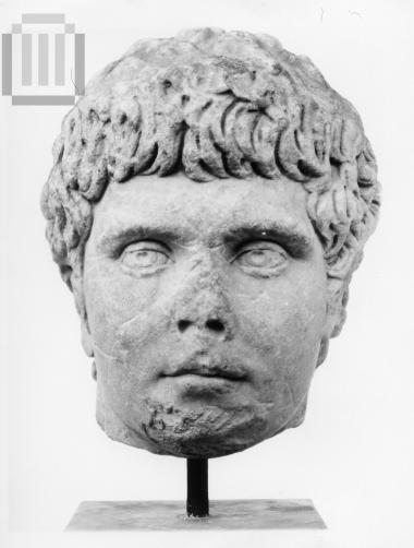 Head of a  male figure statue.