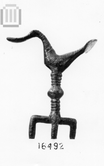 Bronze pendant in the form of bird.