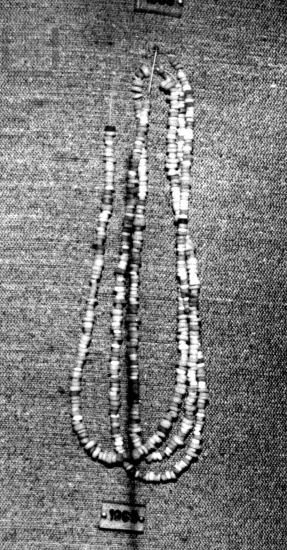 Faience necklace with tiny ring-shaped beads