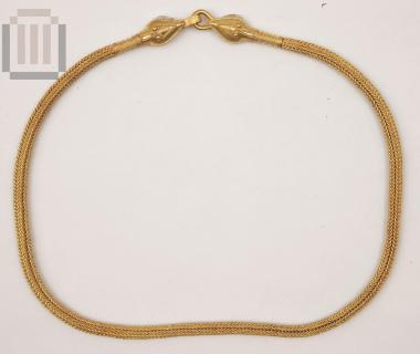 Χρυσό περιδέραιο με κεφαλές φιδιών