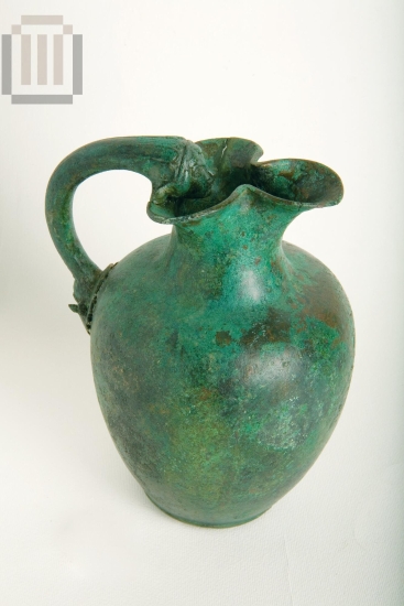 Bronze trefoil-mouthed   oinochoe (jug).