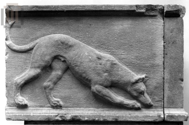 Relief plaque depicting a running dog