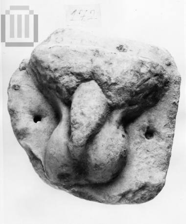 Votive plaque with male genitalia  in relief.