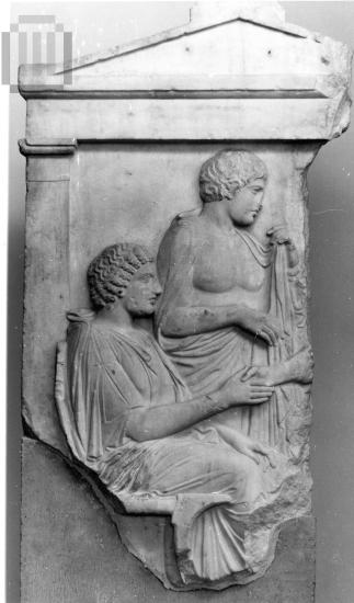 Funerary stele with a  dexiosis  scene of two women.
