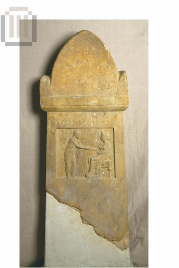 Funerary  inscribed  stele  with decoration in relief.