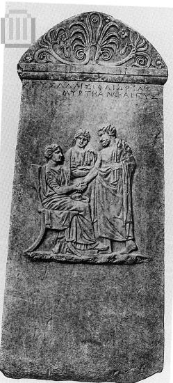 Funerary  inscribed stele  with scene in relief.
