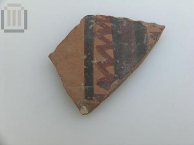Sherd  from  closed shape vase  with bichrome matt- painted decoration.