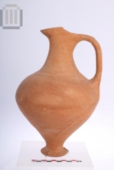 Clay jug with cutaway neck