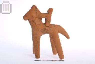 Clay figurine of horse with rider