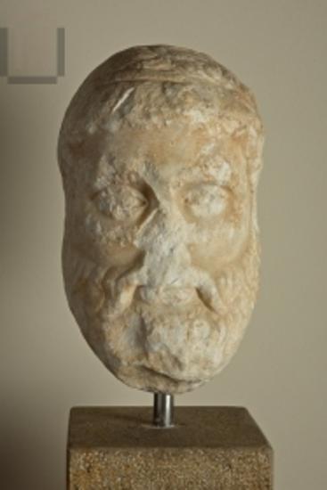 Head of male marble statue