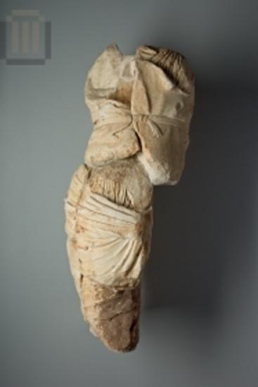 Part of a female sculpture from the west pediment of the Classical temple of Apollo