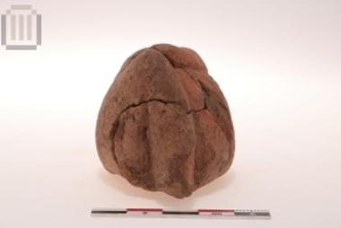 Part of clay female figurine