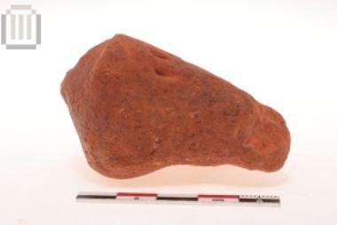 Part of clay female figurine