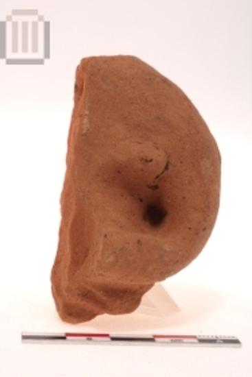 Part of human (female) figurine