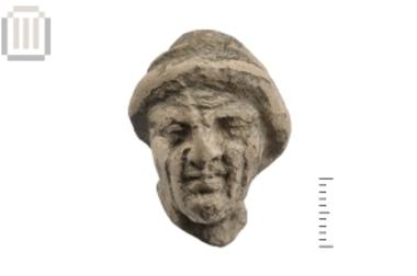 Πήλινη κεφαλή ειδωλίου ανδρικής μορφής από την Ελέα