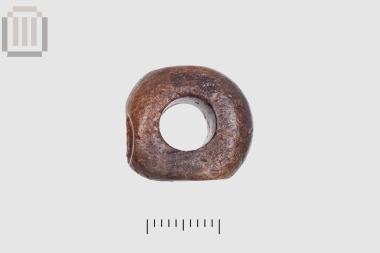 Bone button or bead from Dymokastro